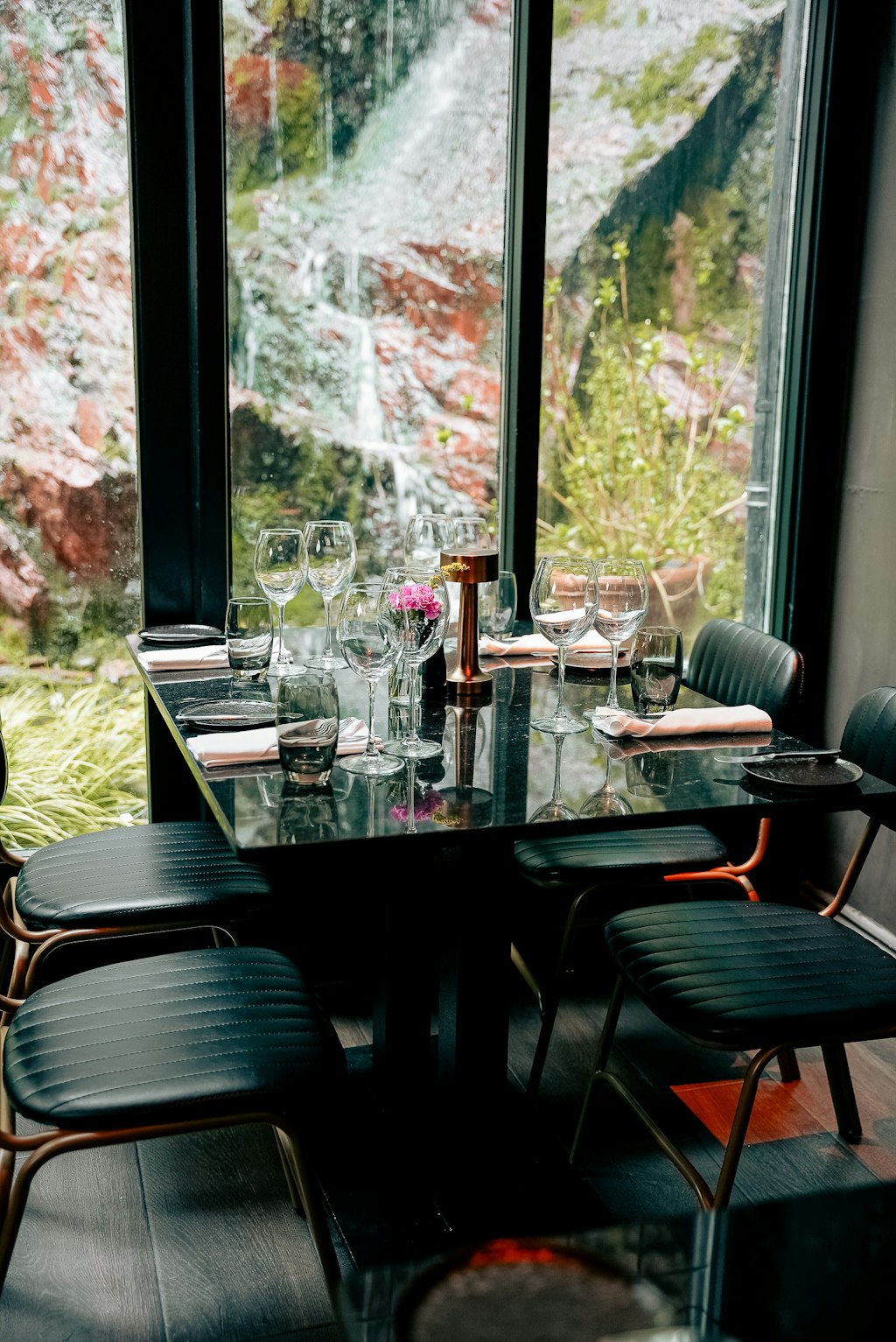 A dining table beside the waterfall at Greenes restaurant in Cork